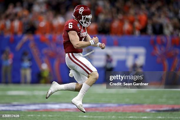 Baker Mayfield of the Oklahoma Sooners reacts after a touchdown against the Auburn Tigers during the Allstate Sugar Bowl at the Mercedes-Benz...