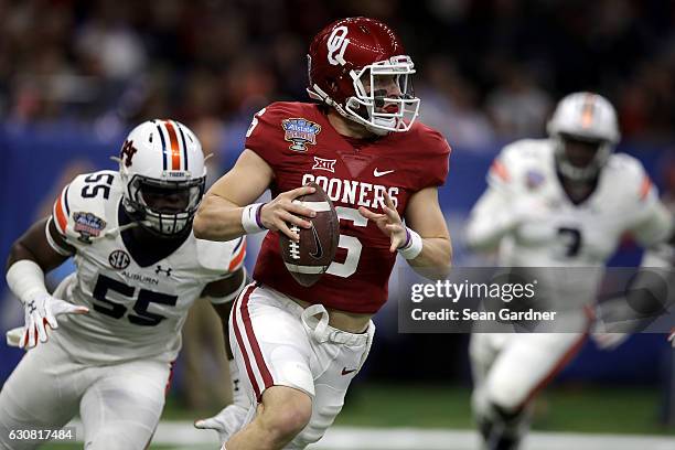 Baker Mayfield of the Oklahoma Sooners throws a pass against the Auburn Tigers during the Allstate Sugar Bowl at the Mercedes-Benz Superdome on...
