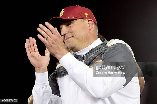 Trojans head coach Clay Helton reacts after defeating the Penn State Nittany Lions 52-49 to win the 2017 Rose Bowl Game presented by Northwestern...