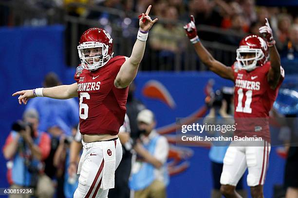 Baker Mayfield of the Oklahoma Sooners reacts after scoring a touchdown against the Auburn Tigers during the Allstate Sugar Bowl at the Mercedes-Benz...