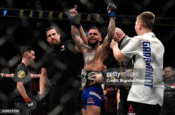 Cody Garbrandt celebrates his victory over Dominick Cruz during the UFC 207 event at T-Mobile Arena on December 30, 2016 in Las Vegas, Nevada.