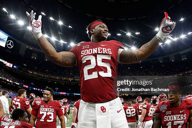 Joe Mixon of the Oklahoma Sooners reacts after a touchdown against the Auburn Tigers during the Allstate Sugar Bowl at the Mercedes-Benz Superdome on...