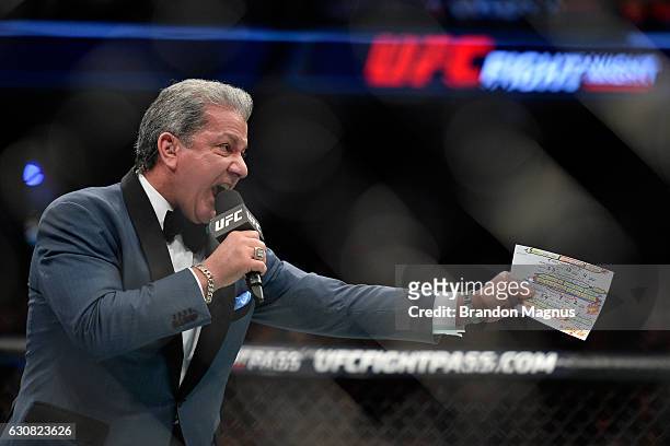 Announcer Bruce Buffer introduces Paige VanZant in her women's strawweight bout during the UFC Fight Night event inside the Golden 1 Center Arena on...