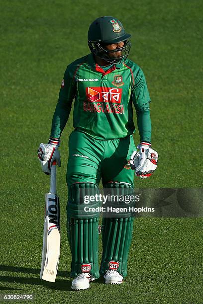 Imrul Kayes of Bangladesh leaves the field after being dismissed during the first Twenty20 match between New Zealand and Bangladesh at McLean Park on...