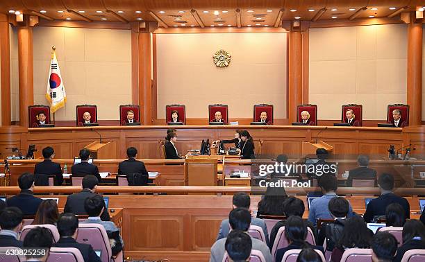Chief Justice Park Han-Chul presides over the first hearing arguments for South Korean President Park Geun-hye's impeachment trial at the...