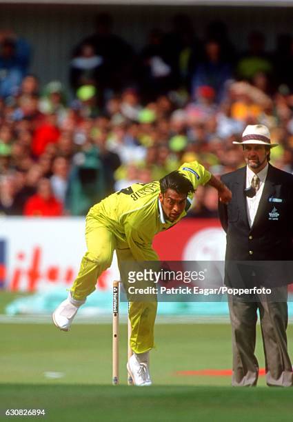 Shoaib Akhtar bowling for Pakistan during the World Cup group match between Australia and Pakistan at Headingley, Leeds, 23rd May 1999. The umpire is...