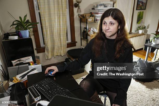 Amanda takes some time to check out social media at her home in Washington, DC. Amanda has been a target of the pizzagate online harassment attacks....