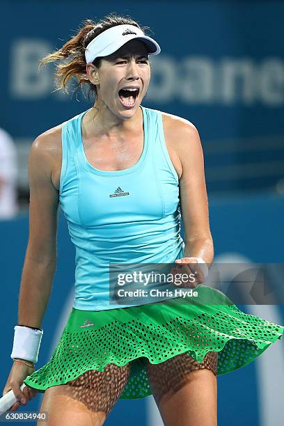 Garbine Muguruza of Spain celebrates winning her match against Daria Kasatkina of Russia on day three of the 2017 Brisbane International at Pat...