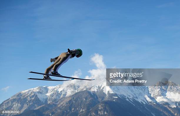 Cene Prevc of Slovenia soars through the air during his qualification jump on Day 1 of the 65th Four Hills Tournament ski jumping event on January 3,...