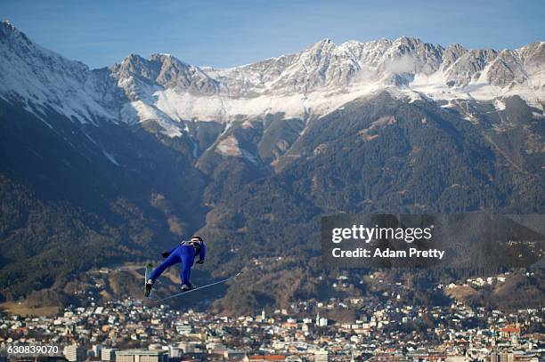 Andreas Kofler of Austria soars through the air during his qualification jump on Day 1 of the 65th Four Hills Tournament ski jumping event on January...