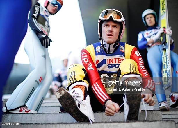 Severin Freund of Germany prepare for his qualification jump on Day 1 of the 65th Four Hills Tournament ski jumping event on January 3, 2017 in...