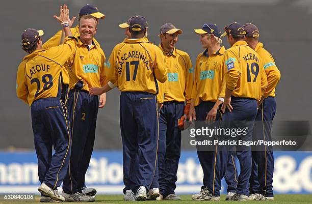Hampshire players celebrate after captain Shaun Udal had bowled Yorkshire's Tim Bresnan for 3 runs in the Cheltenham & Gloucester Trophy Semi Final...