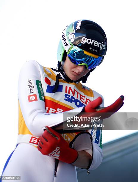 Domen Prevc of Slovenia prepare for his qualification jump on Day 1 of the 65th Four Hills Tournament ski jumping event on January 3, 2017 in...