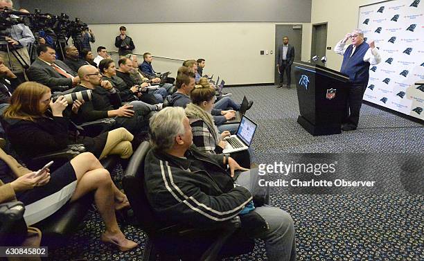 Members of the press listen as Carolina Panthers general manager Dave Gettleman answers a question during his end of season press conference on...