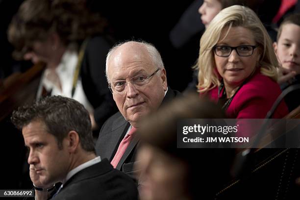 Former US Vice President Dick Cheney sits with his daughter US Congresswoman Liz Cheney , R-Wyoming, during the opening of the 115th US Congress on...