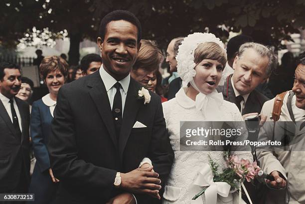 Barbados born West Indies cricketer Garfield Sobers marries Australian born Prue Kirby at a ceremony in Nottingham, England on 11th September 1969.