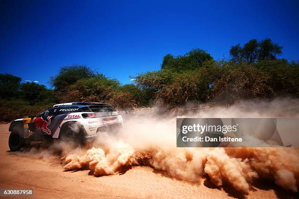 Stephane Peterhansel of France and Peugeot Total drives with co-driver Jean Paul Cottret of France in the 3008 DKR Peugeot car in the Classe : T1.4 2...