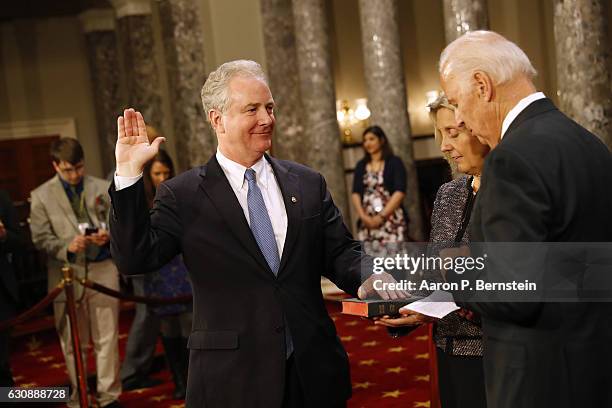 Sen. Chris Van Hollen participates in a reenacted swearing-in with U.S. Vice President Joe Biden in the Old Senate Chamber at the U.S. Capitol...