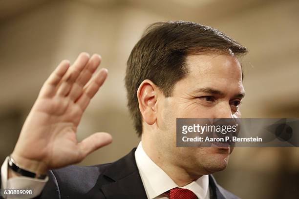 Sen. Marco Rubio participates in a reenacted swearing-in with U.S. Vice President Joe Biden in the Old Senate Chamber at the U.S. Capitol January 3,...