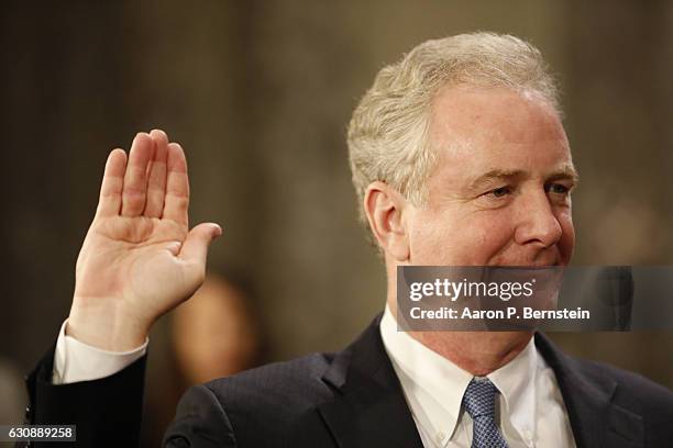 Sen. Chris Van Hollen participates in a reenacted swearing-in with U.S. Vice President Joe Biden in the Old Senate Chamber at the U.S. Capitol...