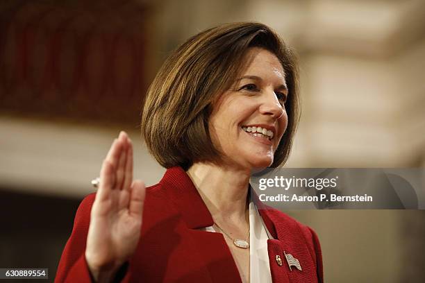 Sen. Catherine Cortez Masto participates in a reenacted swearing-in with U.S. Vice President Joe Biden in the Old Senate Chamber at the U.S. Capitol...