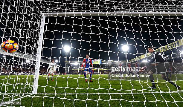 Wayne Hennessey of Crystal Palace watches the ball as Alfie Mawson of Swansea City scores the opening goal during the Premier League match between...
