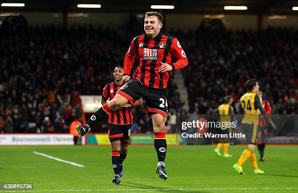 Ryan Fraser of AFC Bournemouth celebrates scoring his team's third goal during the Premier League match between AFC Bournemouth and Arsenal at...