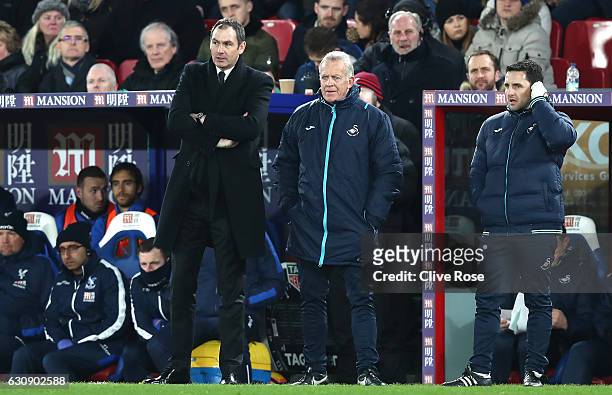 Swansea City new manager Paul Clement stands next to caretaker manager Alan Curtis during the Premier League match between Crystal Palace and Swansea...