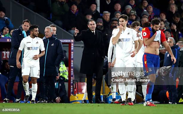 Swansea City new manager Paul Clement stands on the touchline during the Premier League match between Crystal Palace and Swansea City at Selhurst...