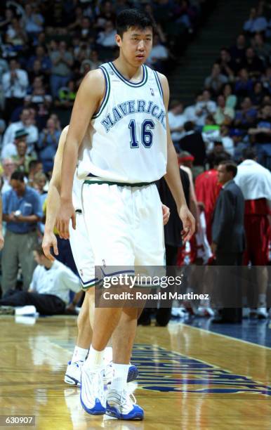 Newly acquired Wang Zhi Zhi of the Dallas Mavericks leaves the court after playing in his first NBA game against the Atlanta Hawks at Reunion Arena...