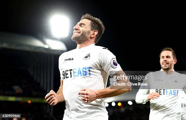 Angel Rangel of Swansea City celebrates scoring his team's second goal during the Premier League match between Crystal Palace and Swansea City at...