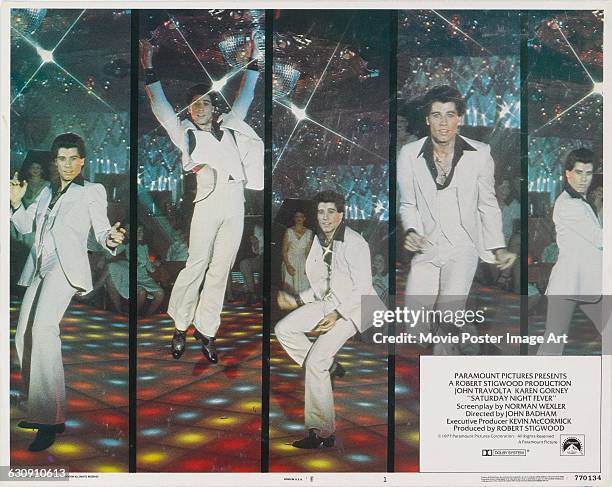 Lobby card for the 1977 US film 'Saturday Night Fever', featuring actor and dancer John Travolta. The film was distributed by Paramount Pictures.