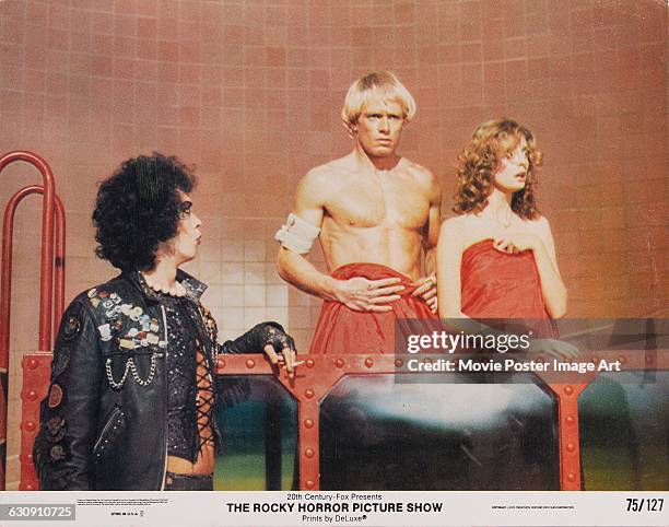 From left to right, actors Tim Curry, Peter Hinwood and Susan Sarandon as Dr Frank-N-Furter, Rocky Horror and Janet Weiss respectively, on a lobby...