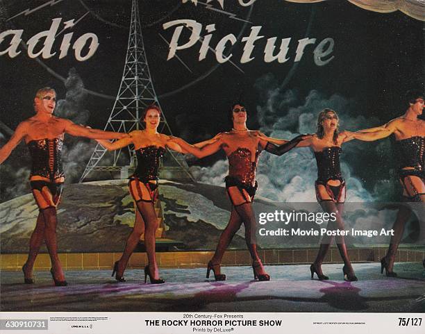 Lobby card from the 1975 musical comedy 'The Rocky Horror Picture Show', produced by 20th Century Fox. From left to right, Peter Hinwood, Nell...