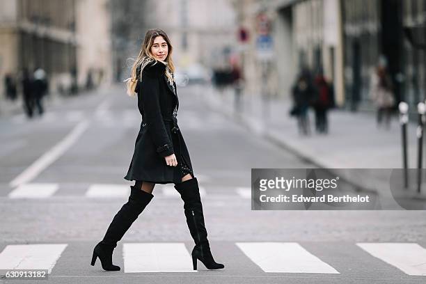 Bianca Derhy, fashion and life style influencer from the blog Bibi Goes Chic, is wearing a Zara black and white top, a Zara black skirt, Daniel...