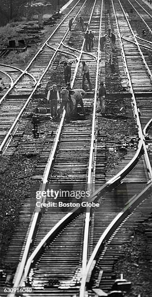 Trackmen lay down new ties for track two eastbound into Boston near Roxbury on Nov. 12, 1976.