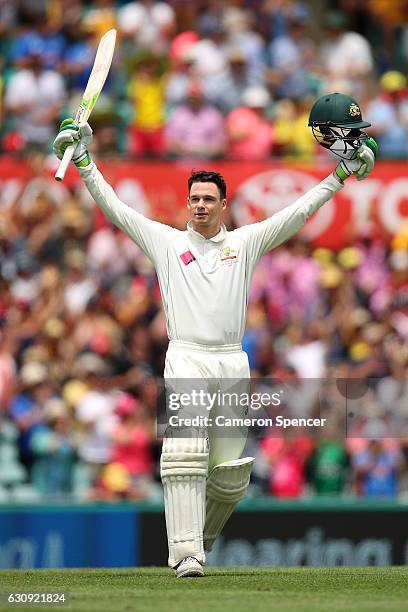 Peter Handscomb of Australia celebrates scoring a century during day two of the Third Test match between Australia and Pakistan at Sydney Cricket...