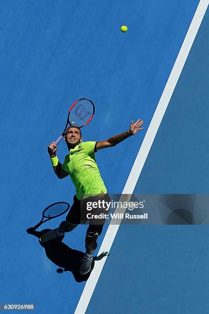 Dan Evans of Great Britain serves to Richard Gasket of France in the Mens singles match on day four of the 2017 Hopman Cup at Perth Arena on January...