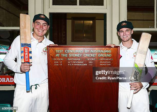 Century makers Matt Renshaw and Peter Handscomb of Australia pose with the new SCG Honour Board after day two of the Third Test match between...