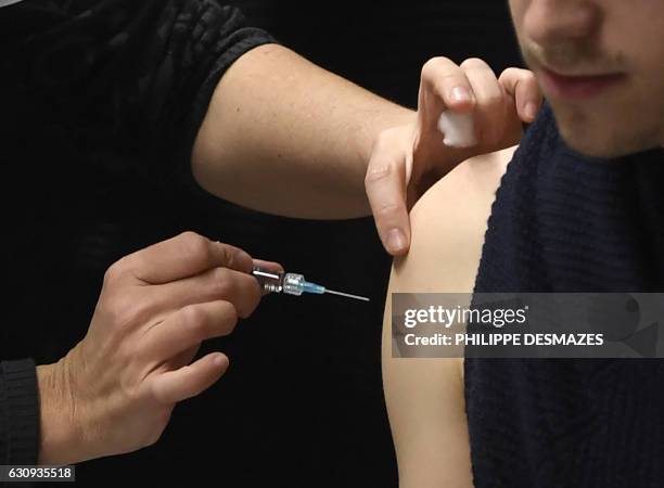 Nurse vaccinates a student against meningitis on January 4, 2017 at the University of Dijon. Thirty thousand people are invited to be vaccinated...