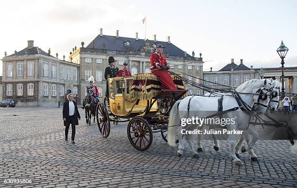 Queen Margrethe of Denmark departs Amalienborg Palace in the Gold Coach to attend a New Year's Levee for officers from the Defence and Danish...