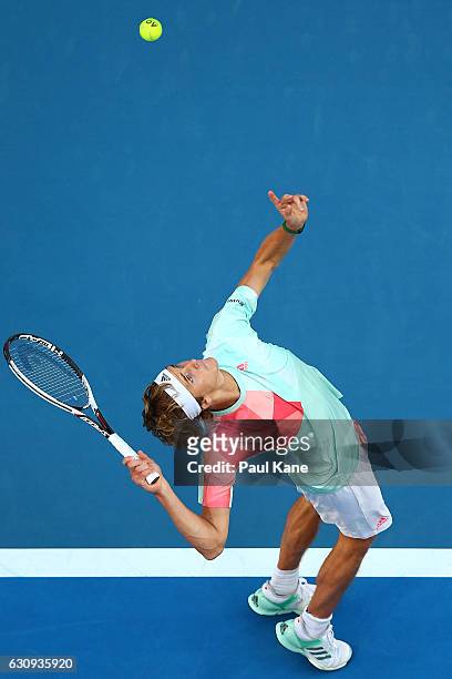 Alexander Zverev of Germany serves during his men's singles match against Roger Federer of Switzerland on day four of the 2017 Hopman Cup at Perth...