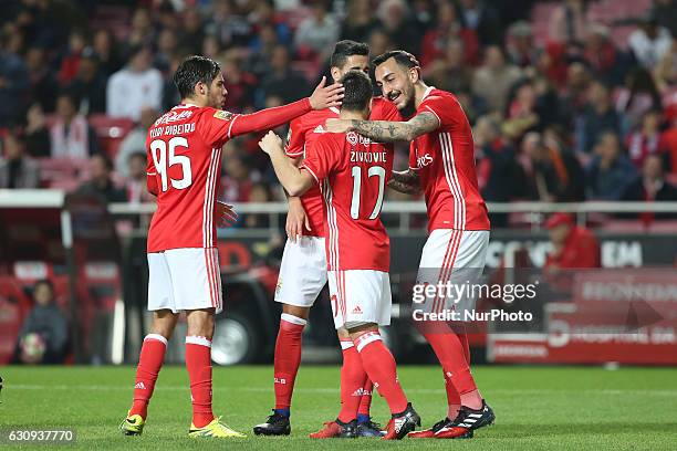 Benfica's forward Kostas Mitroglou celebrates with teammates after scoring during the Portuguese League Cup football match SL Benfica vs FC Vizela at...