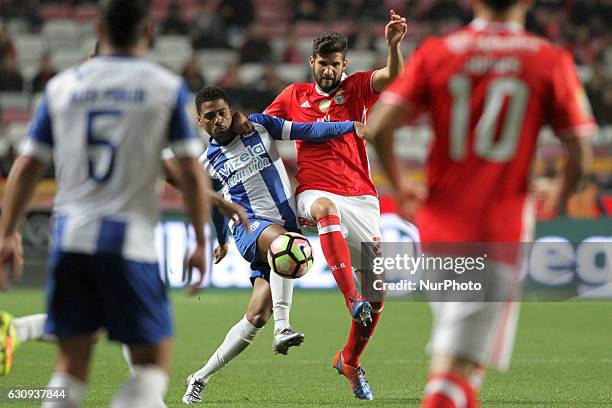 Benfica's defender Lisandro Lopez vies with Vizela's forward Kukula during the Portuguese League Cup football match SL Benfica vs FC Vizela at the...