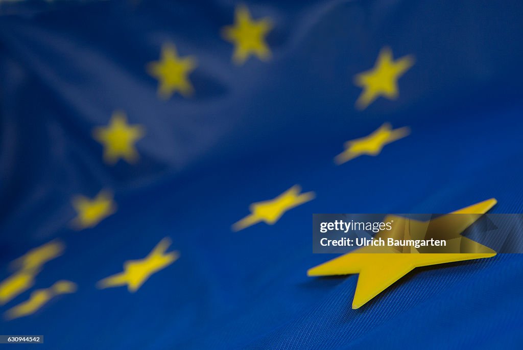 Brexit-the European flag and a star, that is detached from the stars circle of the flag.