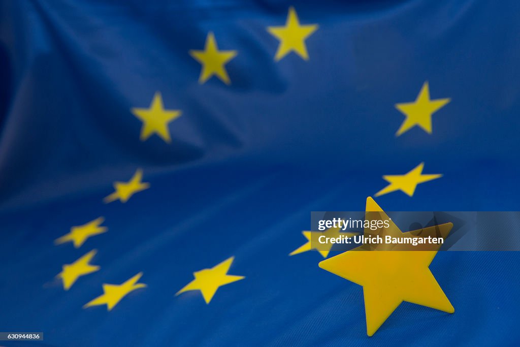 Brexit-the European flag and a star, that is detached from the stars circle of the flag.