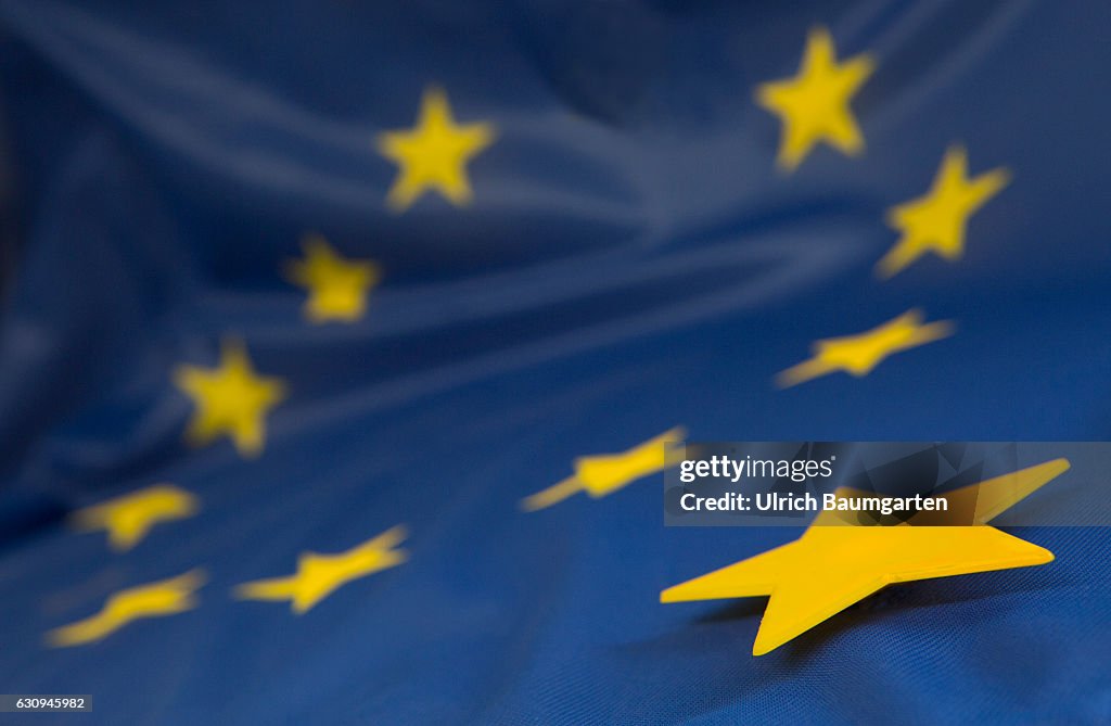 Brexit-the European flag and a star, that is detached from the stars circle of the flag.