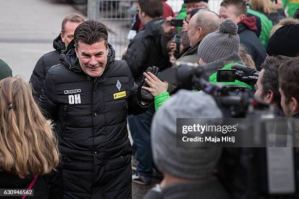 Dieter Hecking, the newly appointed head coach of Borussia Moenchengladbach is greeted by fans as he arrives to a training session on January 4, 2017...