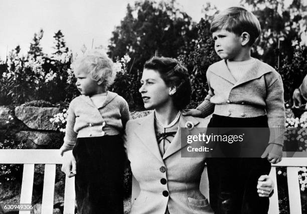 Undated picture of the Queen Elizabeth II with her two children Charles and Ann, posing in Balmoral.