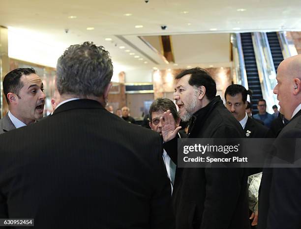 Mexican politician Fernandez Norona is led away by security at Trump Tower on January 4, 2017 in New York City. President-Elect Donald Trump...